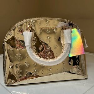 NWT Michael Kors EMMY large dome satchel in pale gold.